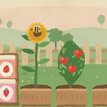 The garden: a sunflower and a tomato plant